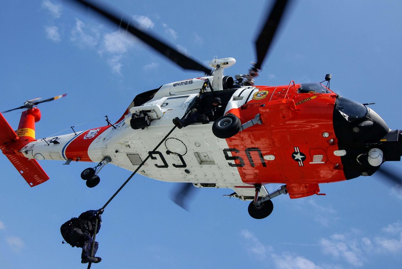 Coast Guard MH-60T Jayhawk medevac man near Venice