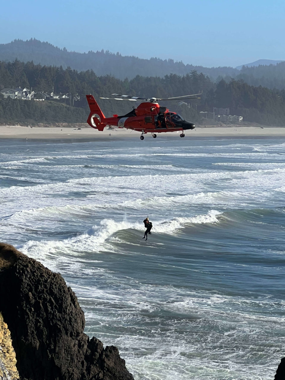 Coast Guard MH-65 aircrew rescue 3 surfers near Agate Beach