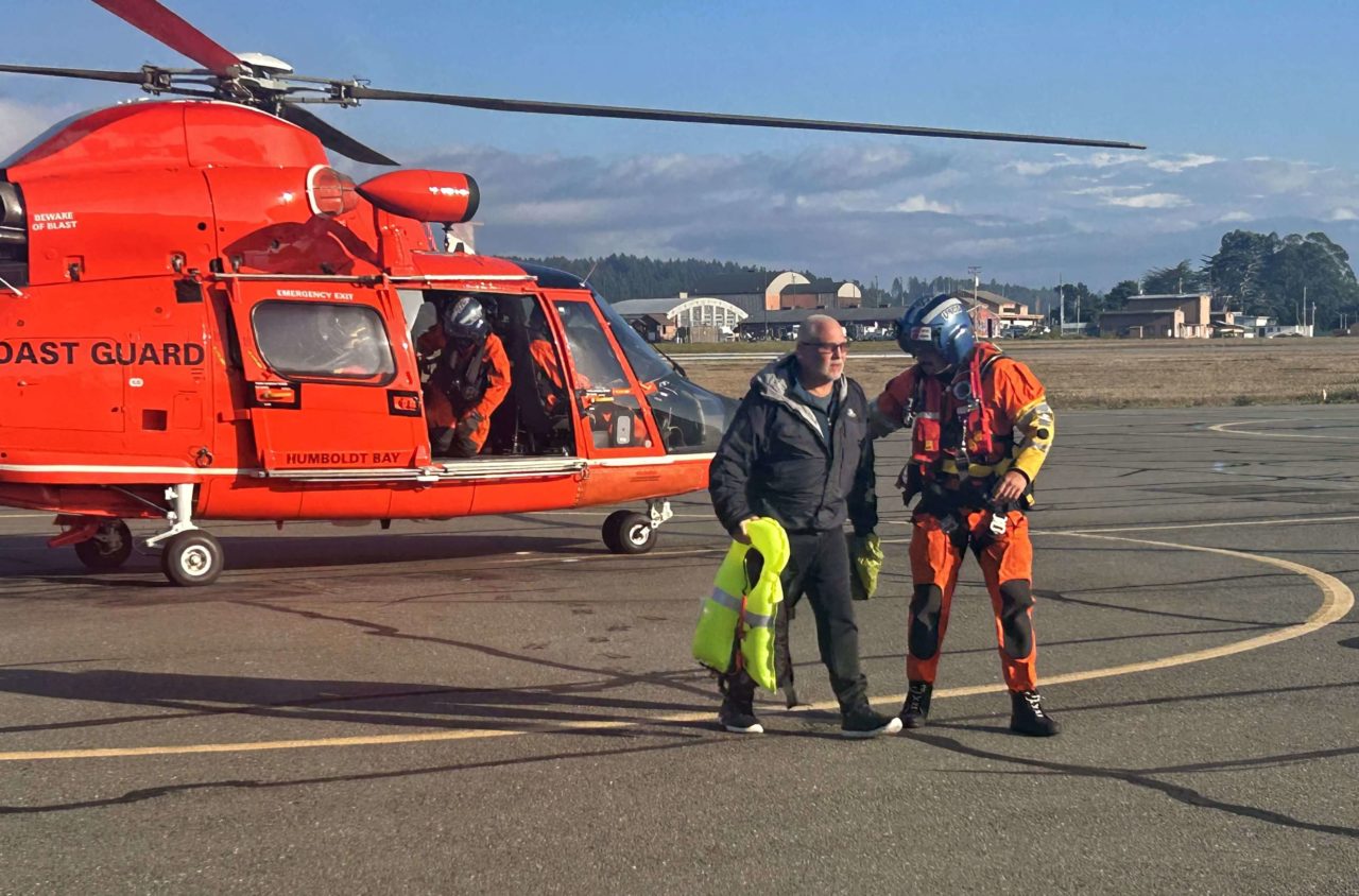 Coast Guard MH-65 rescue sailor offshore Eureka